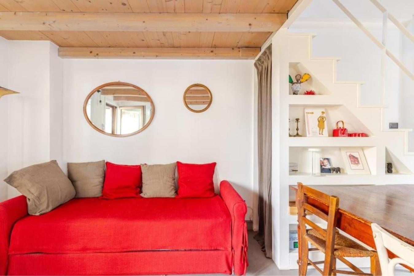 Tiny House on Water Surrounded by Greenery