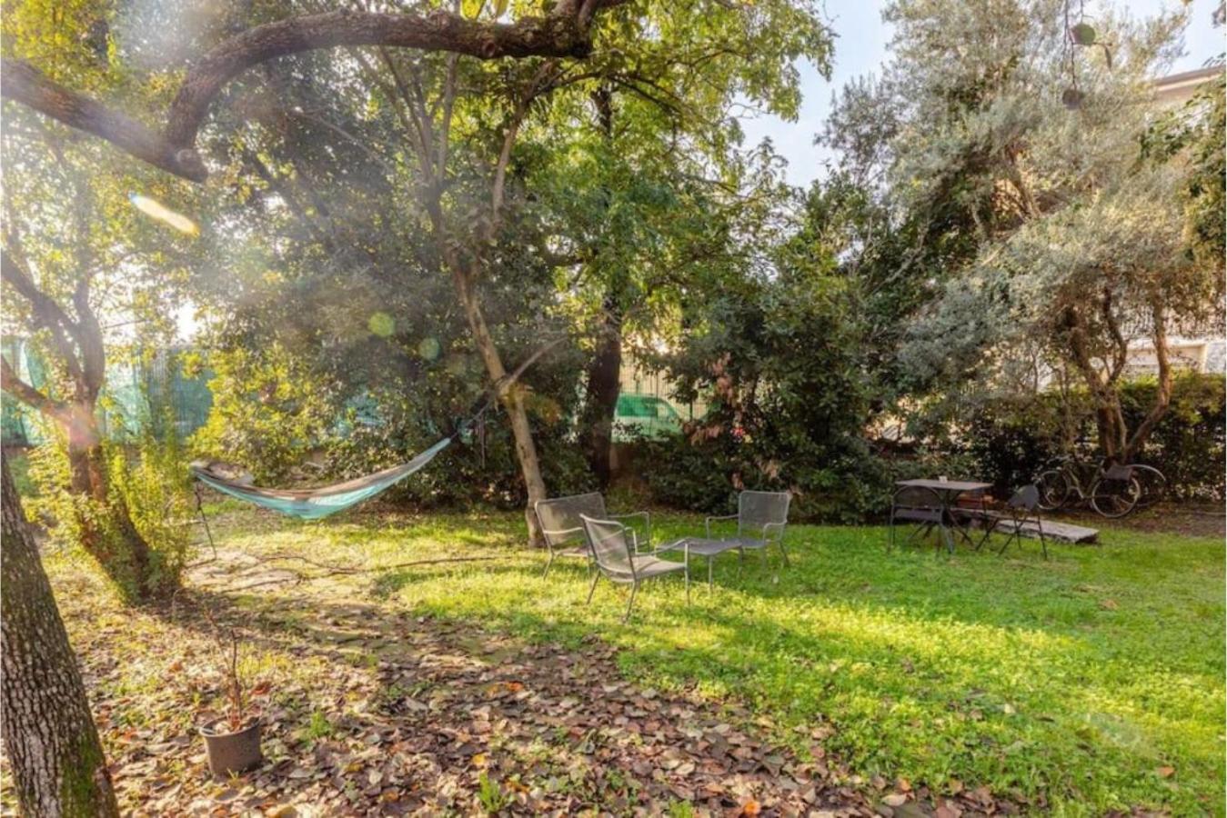 Tiny House on Water Surrounded by Greenery