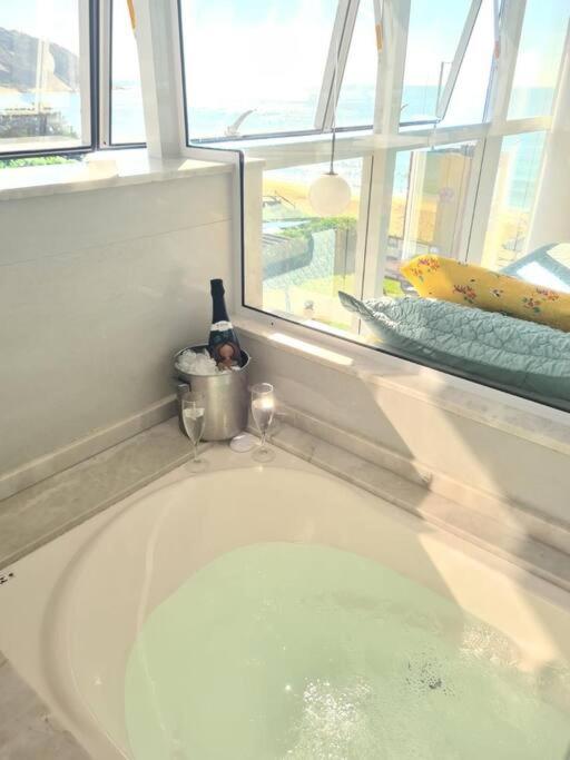 Exclusivo Frente Mar c piscina e jacuzzi térmica