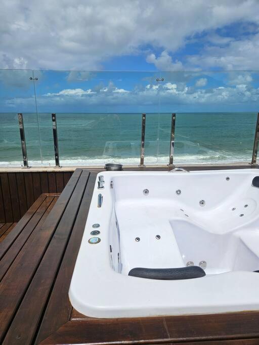 Exclusivo Frente Mar c piscina e jacuzzi térmica