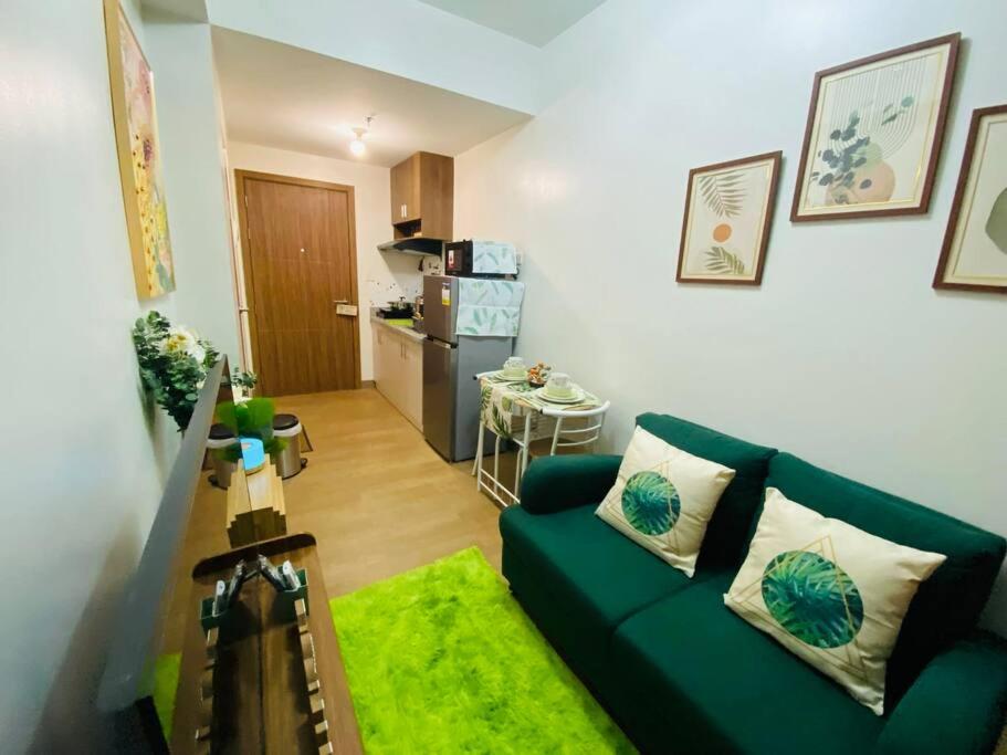 Nature-Inspired 2BR with Pool, WiFi and Tropical Vibes at Spring Residences view 2
