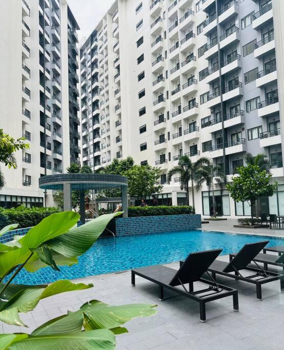 Nature-Inspired 2BR with Pool, WiFi and Tropical Vibes at Spring Residences view 3