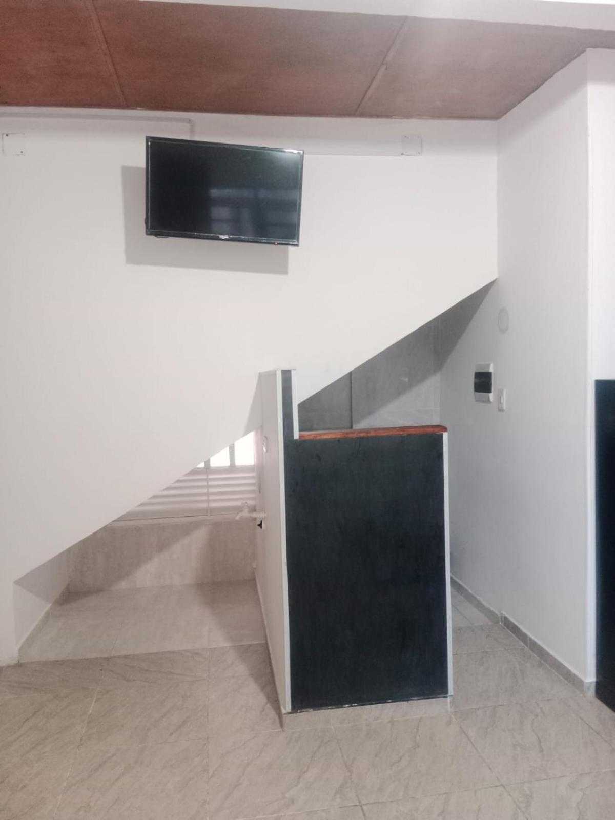 A Apartaestudio central amoblado con cocina y baño
