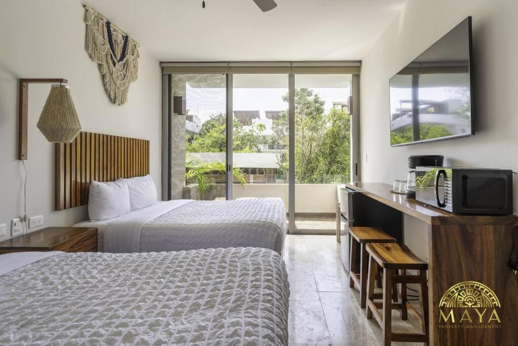NHOA 205A Lux 2BR Condo Pool View in Aldea Zama