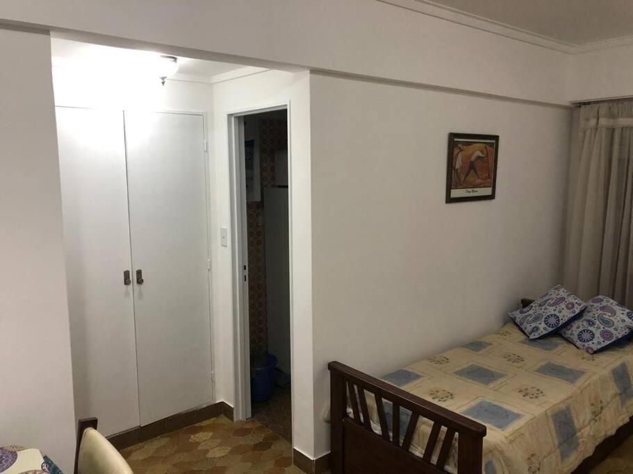 Ambiente céntrico con balcón