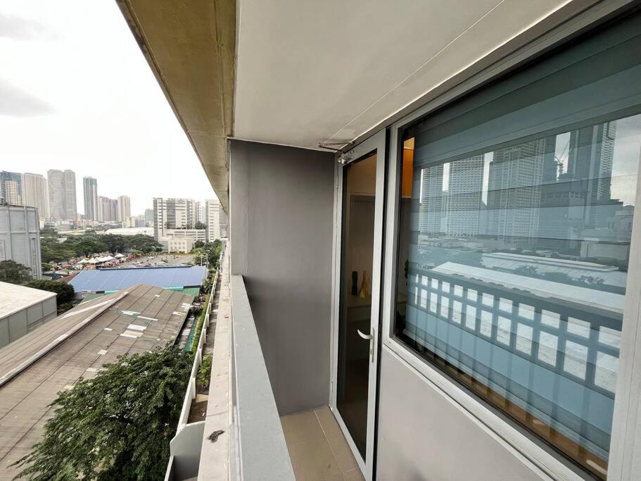 Pop of Yellow Condo Unit in Fame Near Shaw MRT SM Megamall - Staycations by SMS view 2