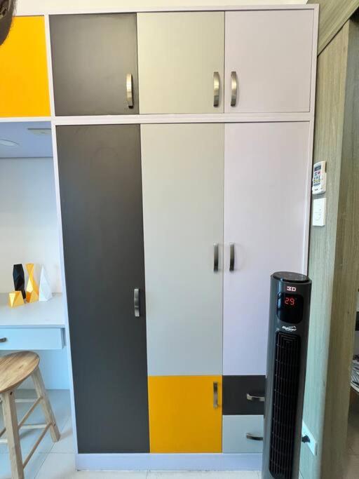 Pop of Yellow Condo Unit in Fame Near Shaw MRT SM Megamall - Staycations by SMS view 4