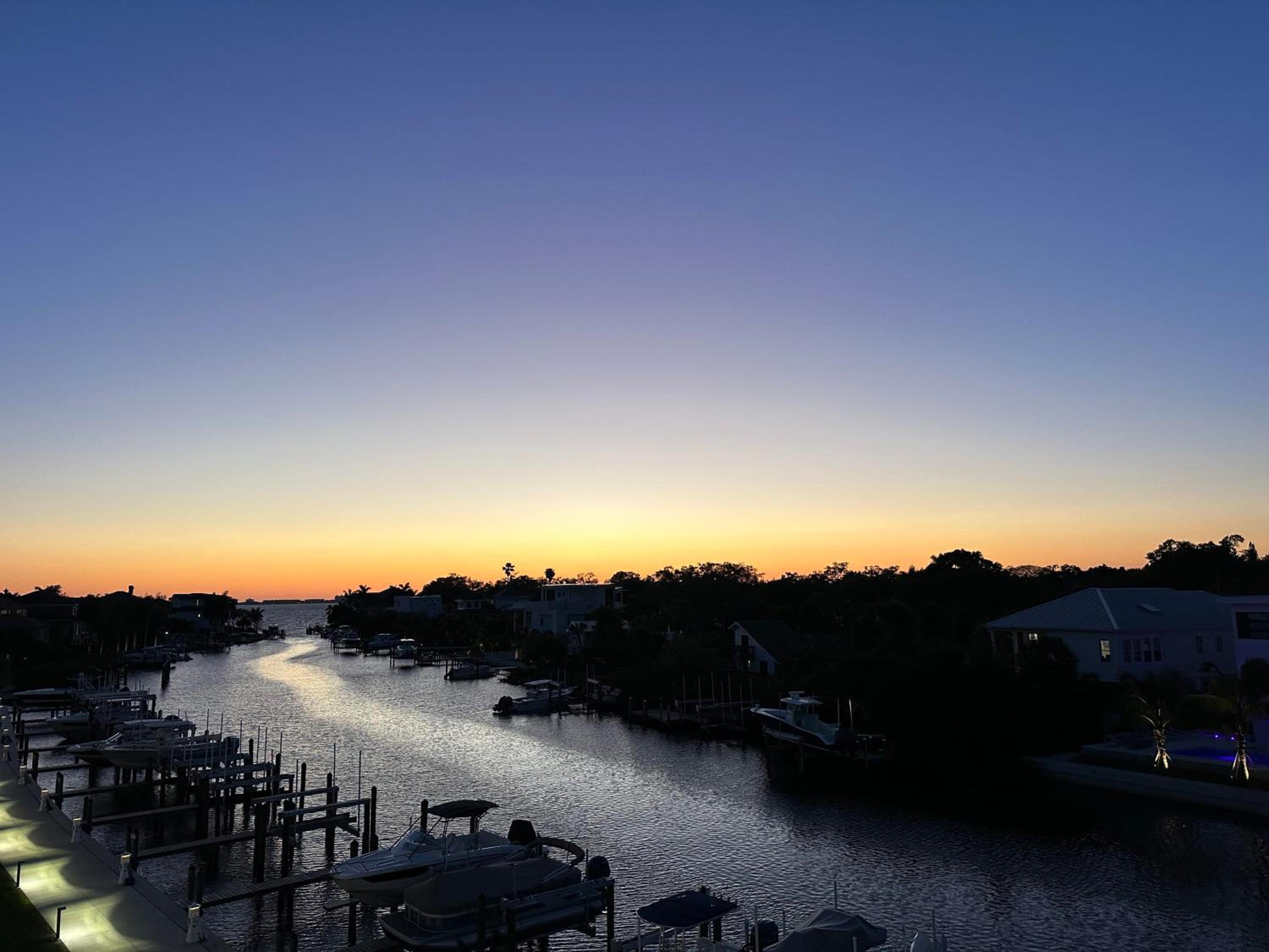 Luxury 2 Bed 2 Bath Waterfront Condo with Patio Sunsets Gym and Parking view 4