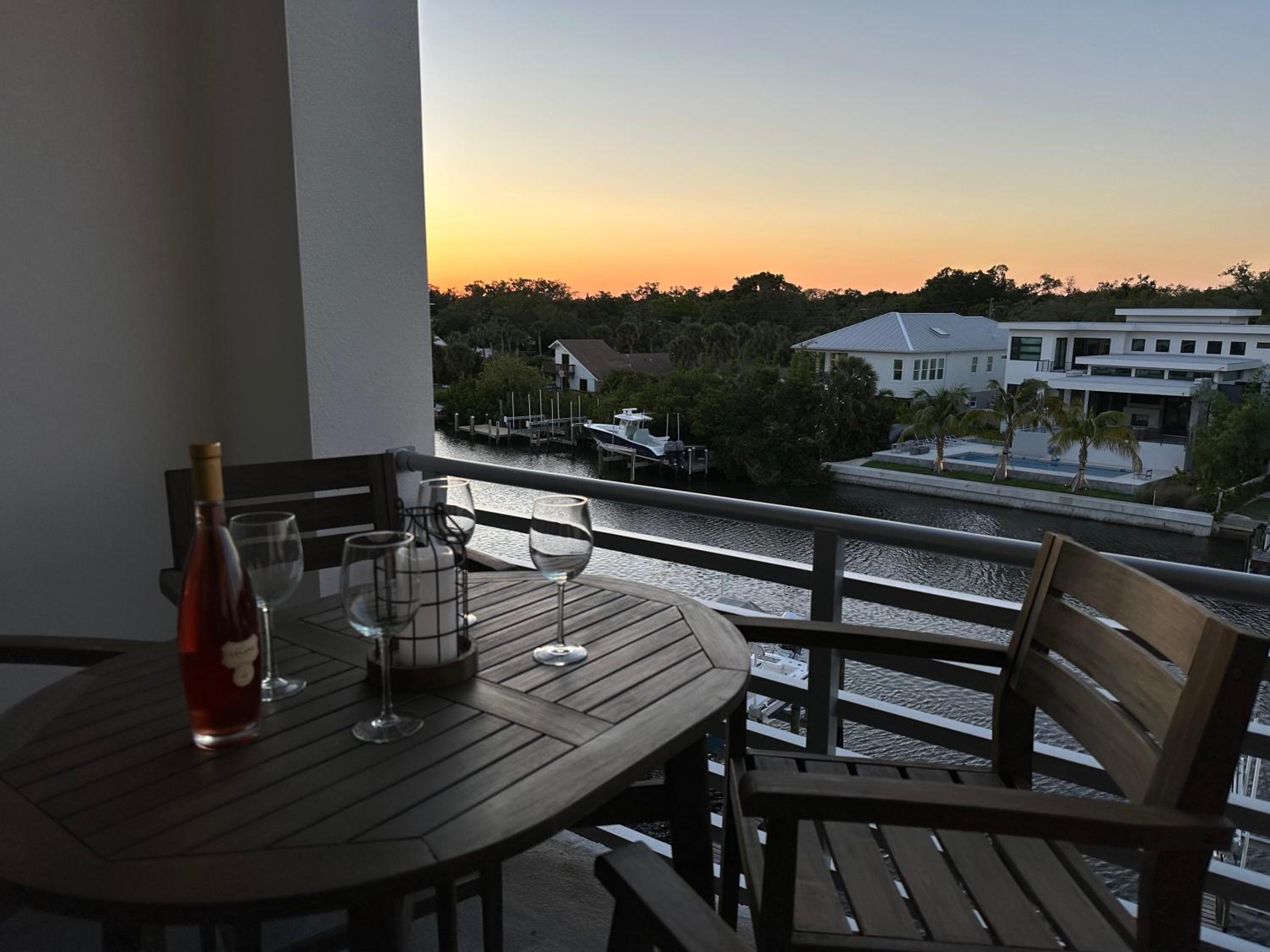 Luxury 2 Bed 2 Bath Waterfront Condo with Patio Sunsets Gym and Parking view 5