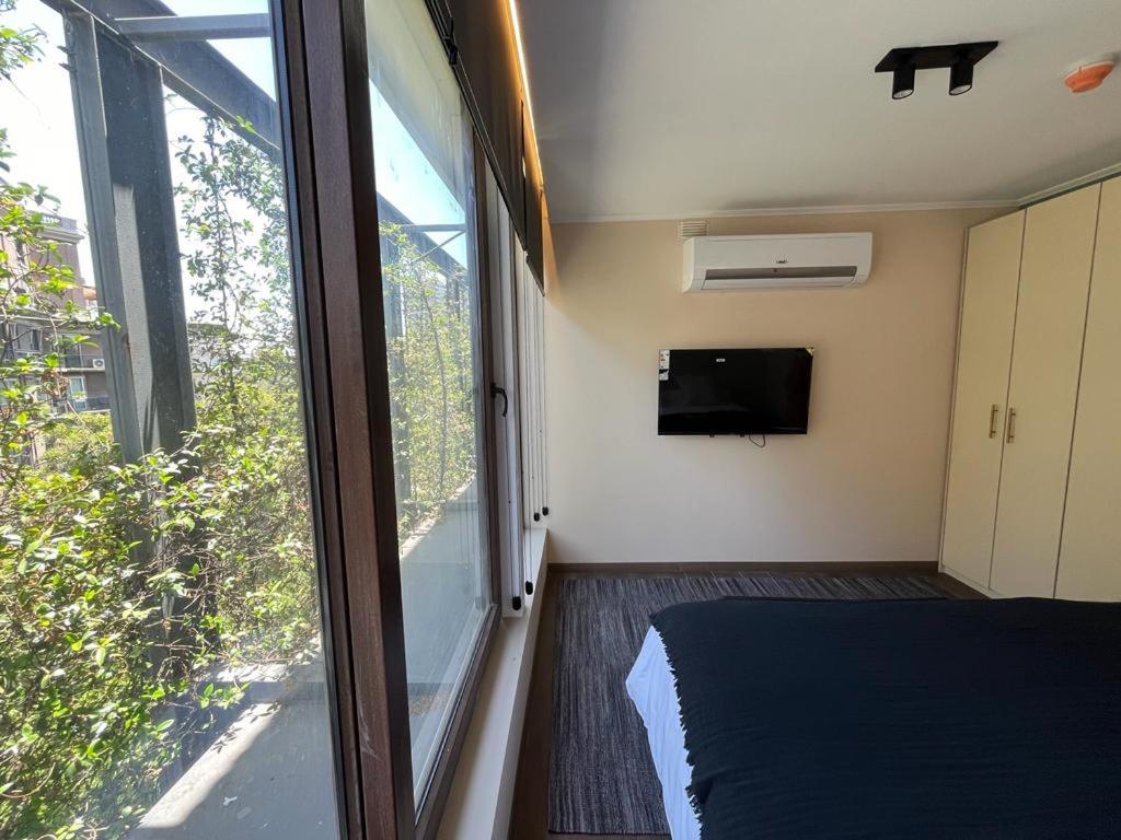 HOM I Amplio y Lujoso Depto 4PAX 2D2B En Santiago