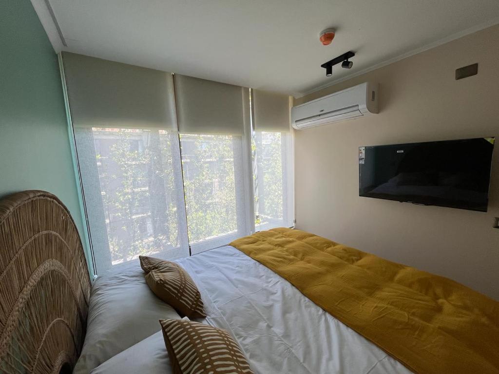 HOM I Amplio y Lujoso Depto 4PAX 2D2B En Santiago