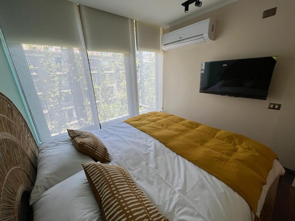 HOM I Amplio y Lujoso Depto 4PAX 2D2B En Santiago