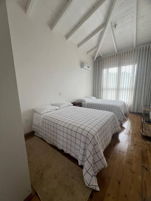 Casa hóspede privativa -Área piscina compartilhada