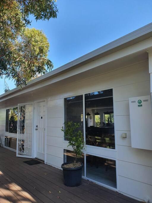 Family beach house among the gum trees