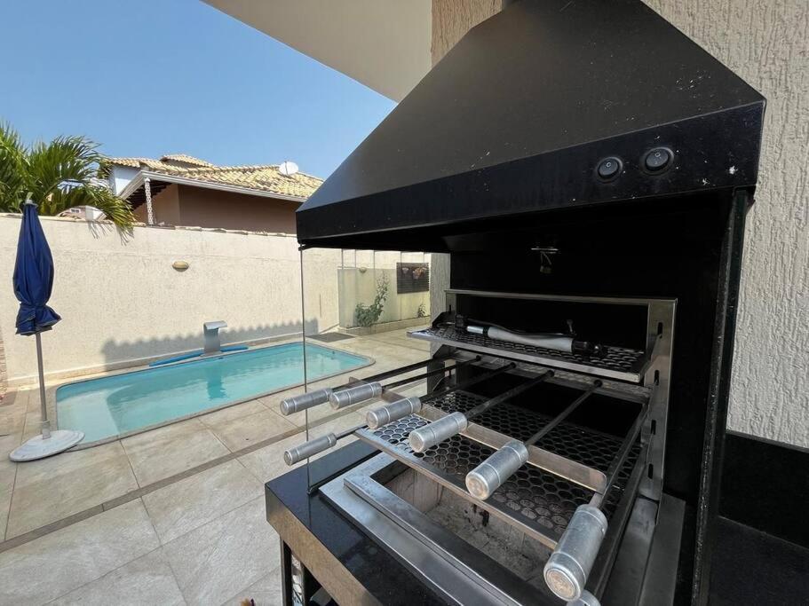Uma casa de familia 4 Q com piscina