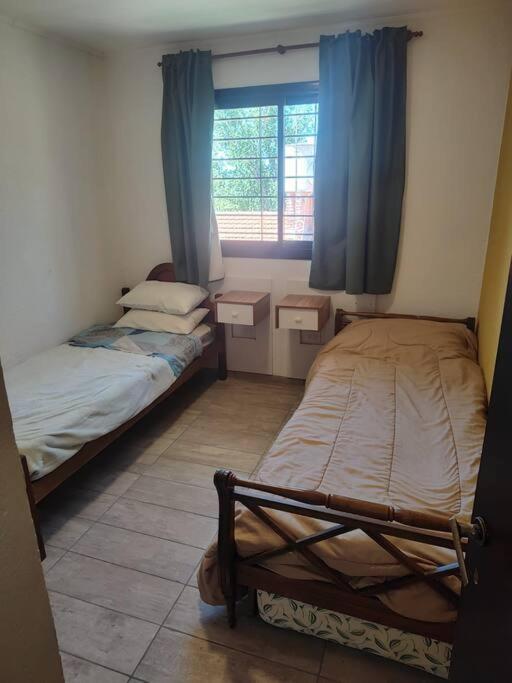 Casa en las sierras de Córdoba con Deck , Parrilla y estacionamiento