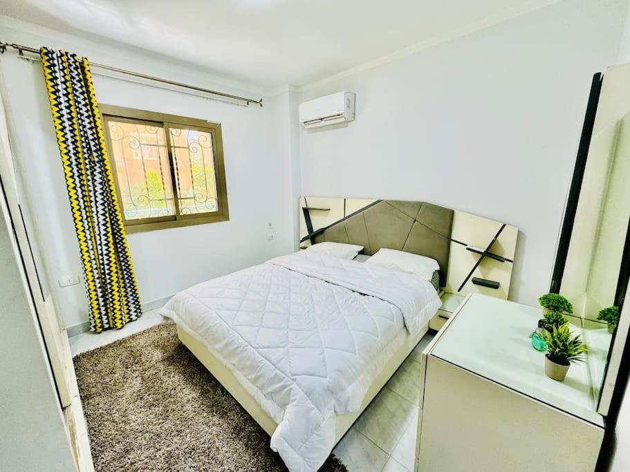 Relaxing Apartment with garden view in New Cairo By landmark Stays