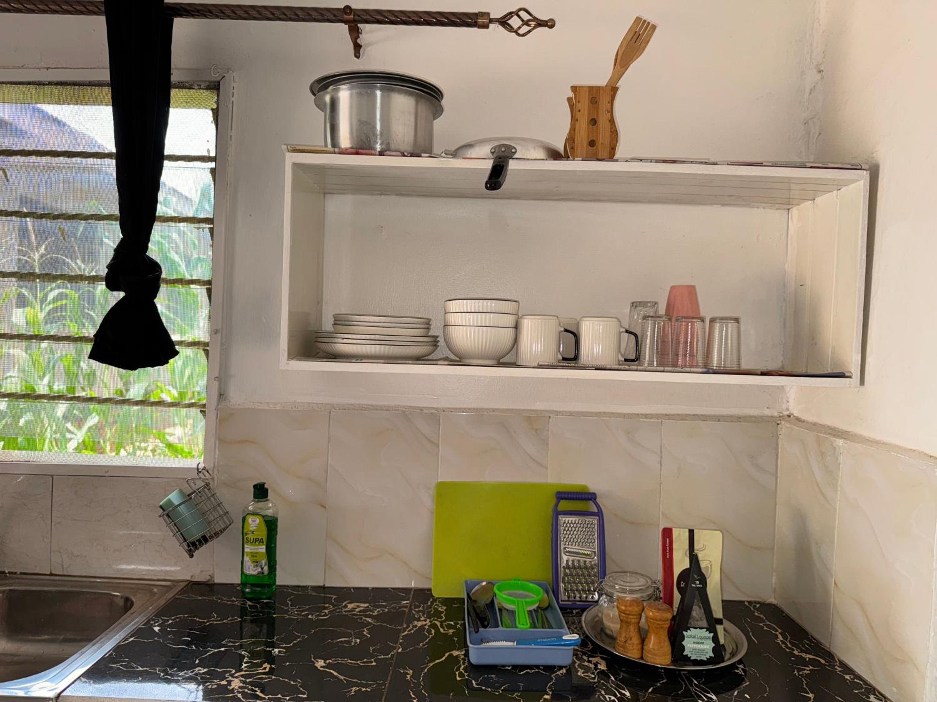 Ministers Village Lush Private Studio with Garden Homestay in Ntinda Kampala view 5