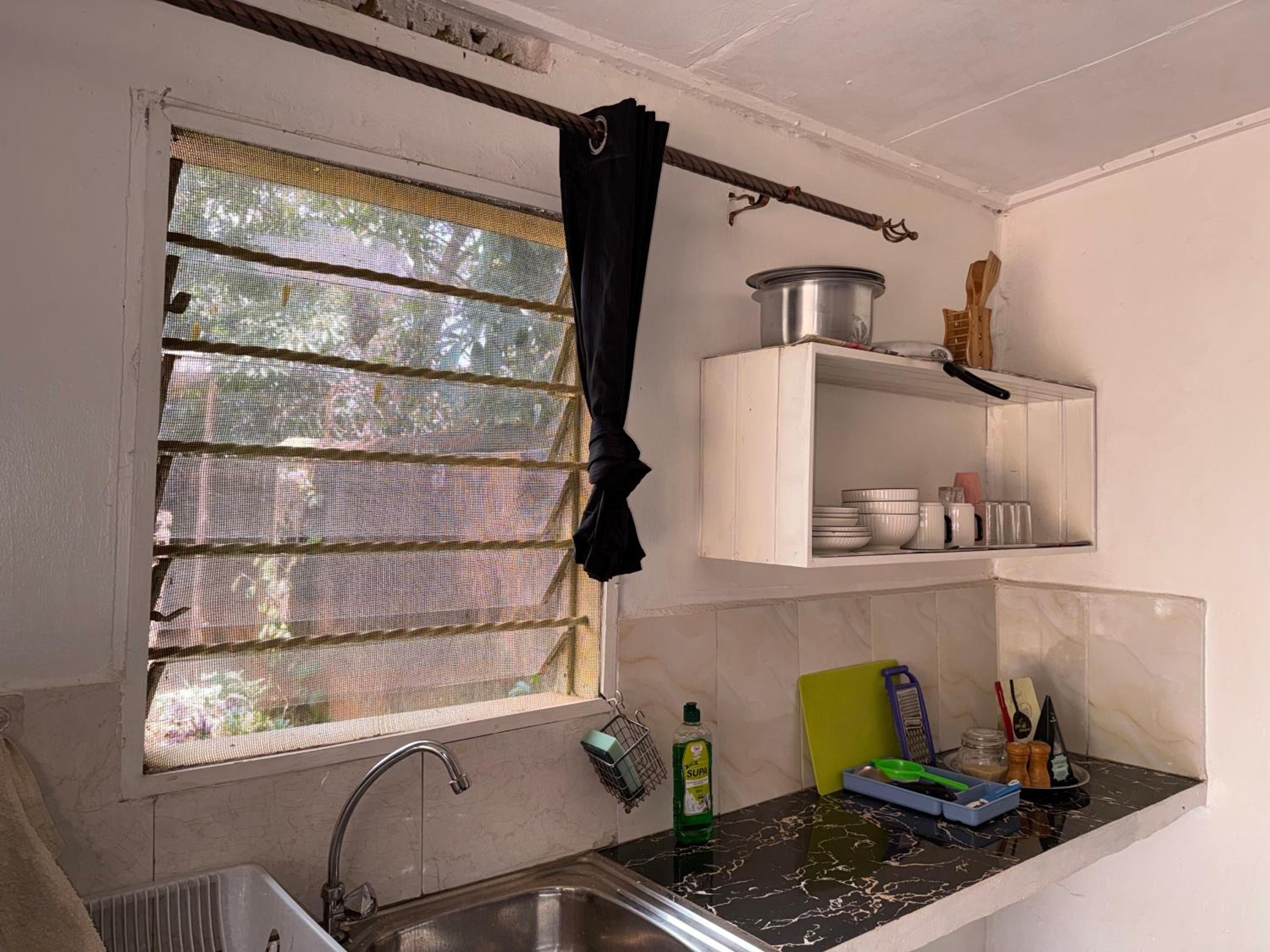 Ministers Village Lush Private Studio with Garden Homestay in Ntinda Kampala view 4