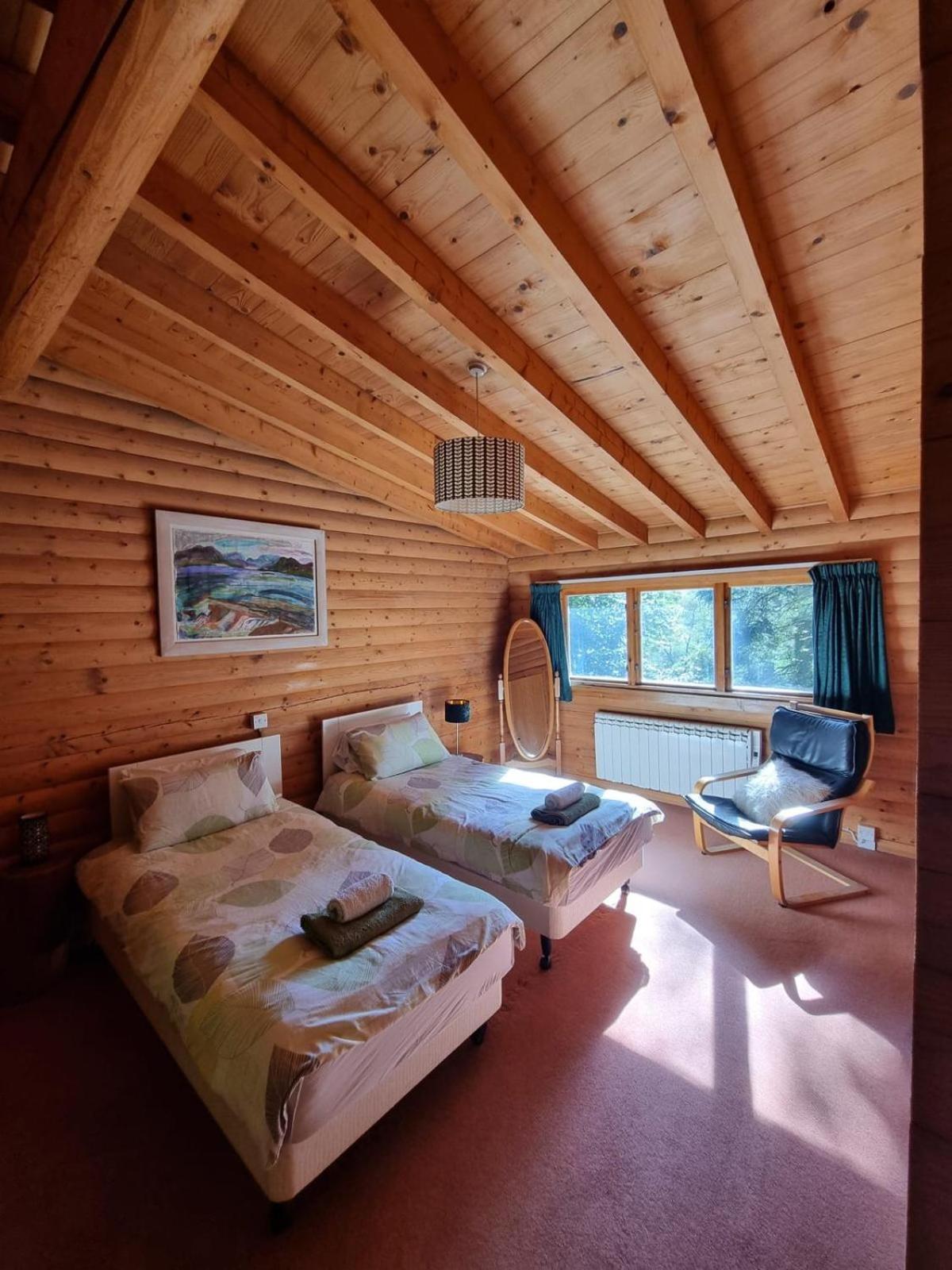 Our Log House in the woods view 2