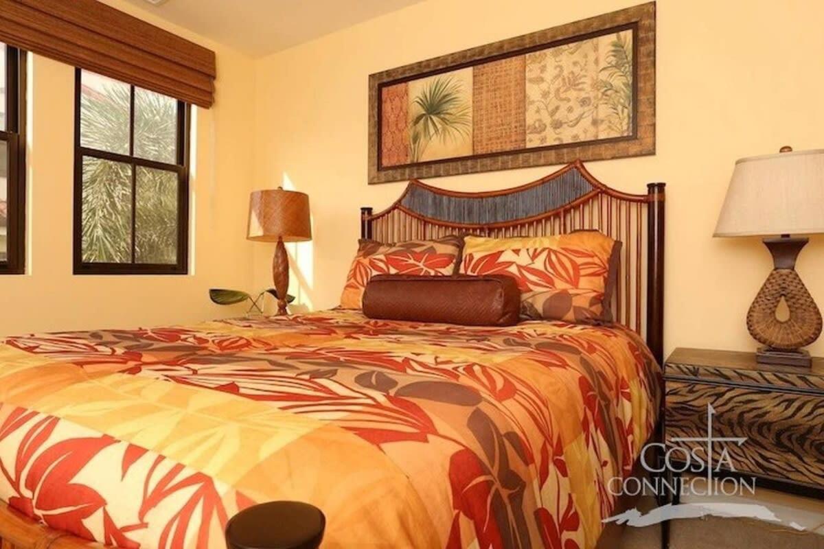 Luxe! Impressively designed 2nd-floor unit in Coco done in red and orange hues