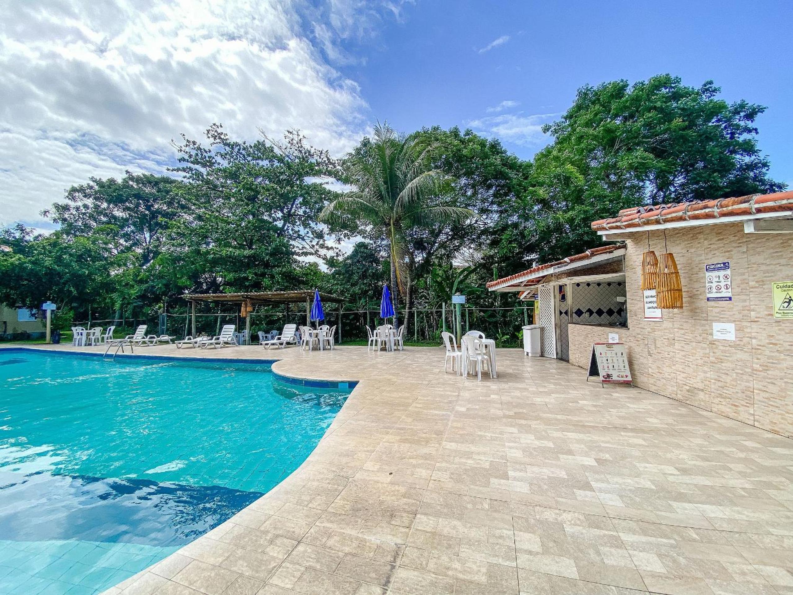 Flat's com 1 quarto, frente praia de Taperapuã, atravessou a rua está na praia, Condomínio Boulevard da Praia conta com piscina, sauna, sala de jogos além 