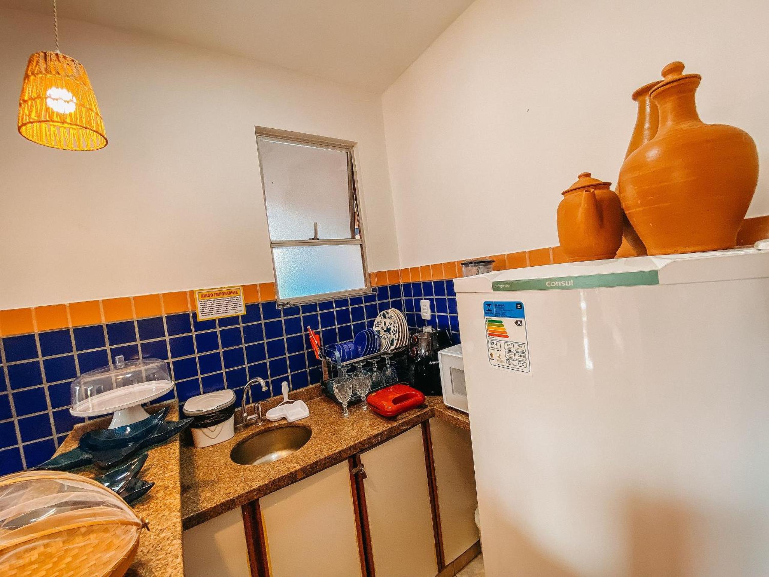 Flat's com 1 quarto, frente praia de Taperapuã, atravessou a rua está na praia, Condomínio Boulevard da Praia conta com piscina, sauna, sala de jogos além 