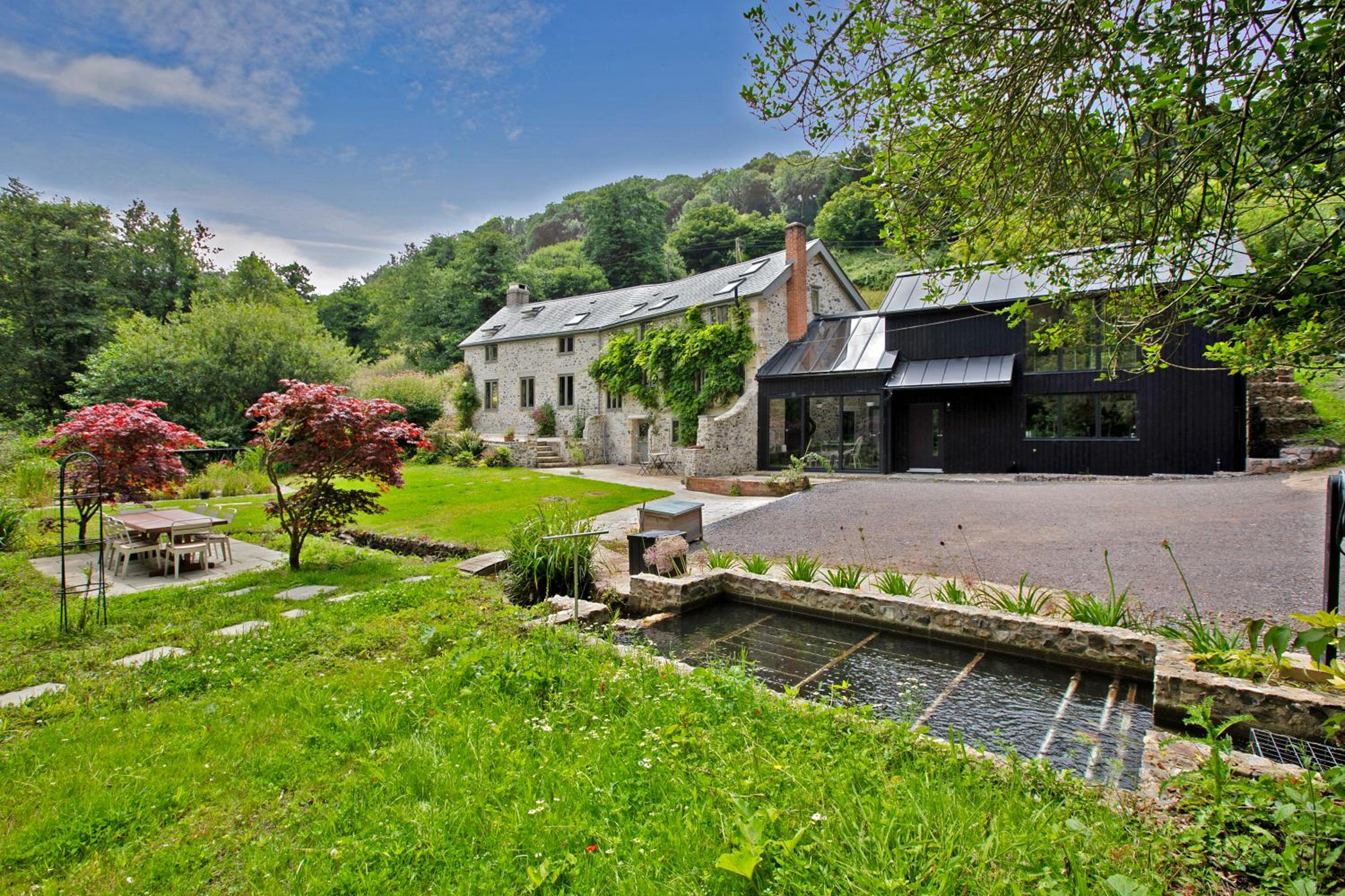 Idyllic country house & organic swim pond view 5