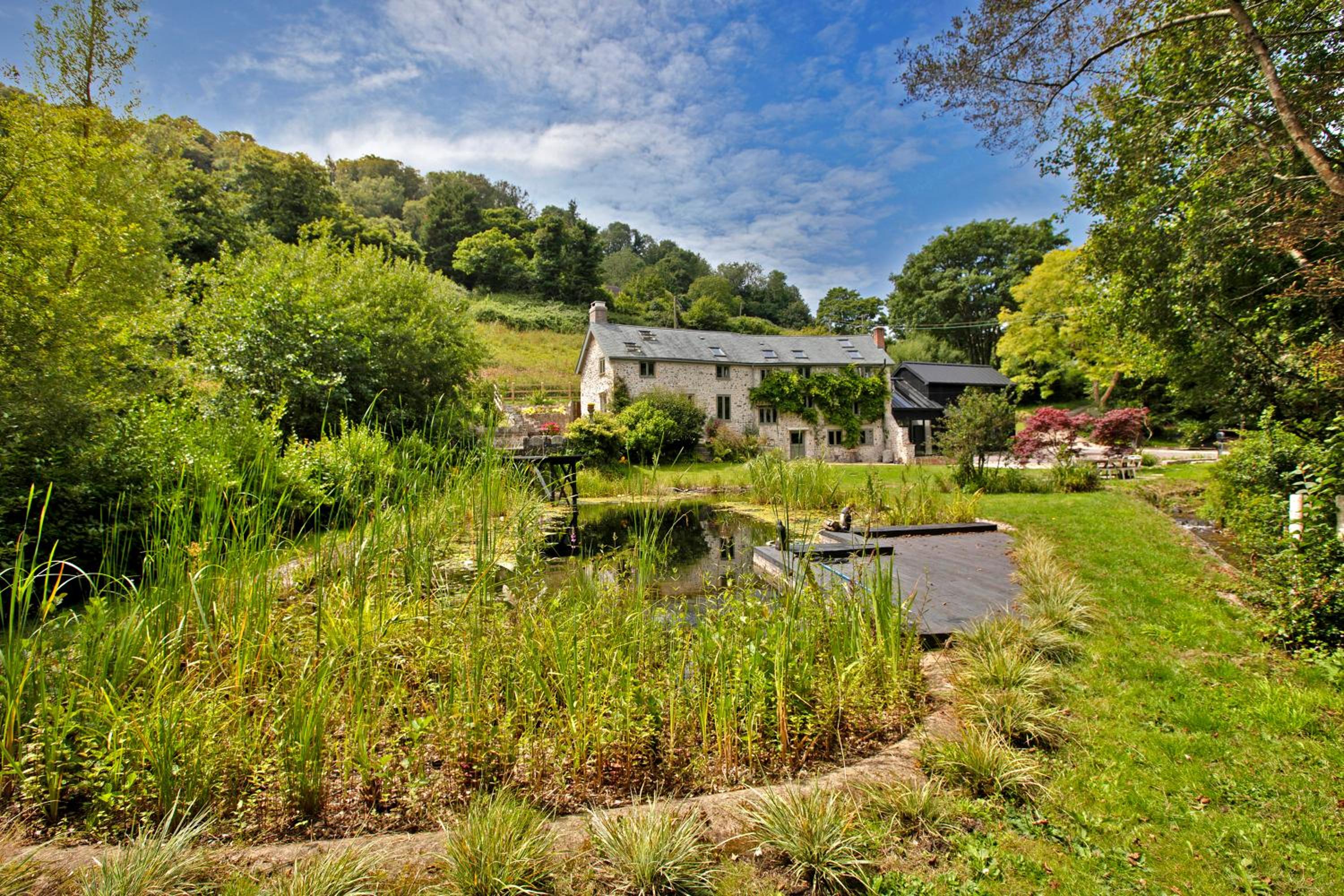 Idyllic country house & organic swim pond view 2
