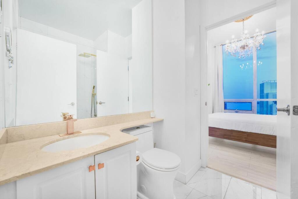 Penthouse Corner Suite with Panoramic 12 FT Windows