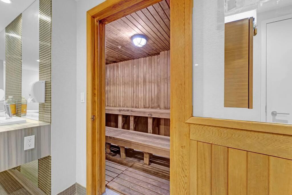 Penthouse Corner Suite with Panoramic 12 FT Windows