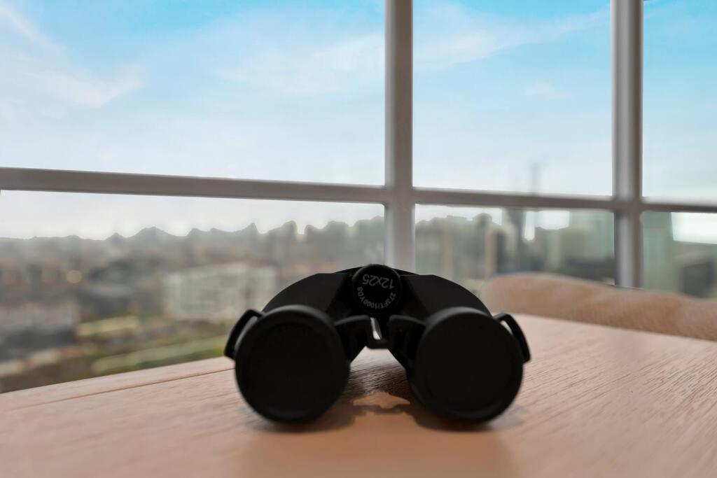 Penthouse Corner Suite with Panoramic 12 FT Windows