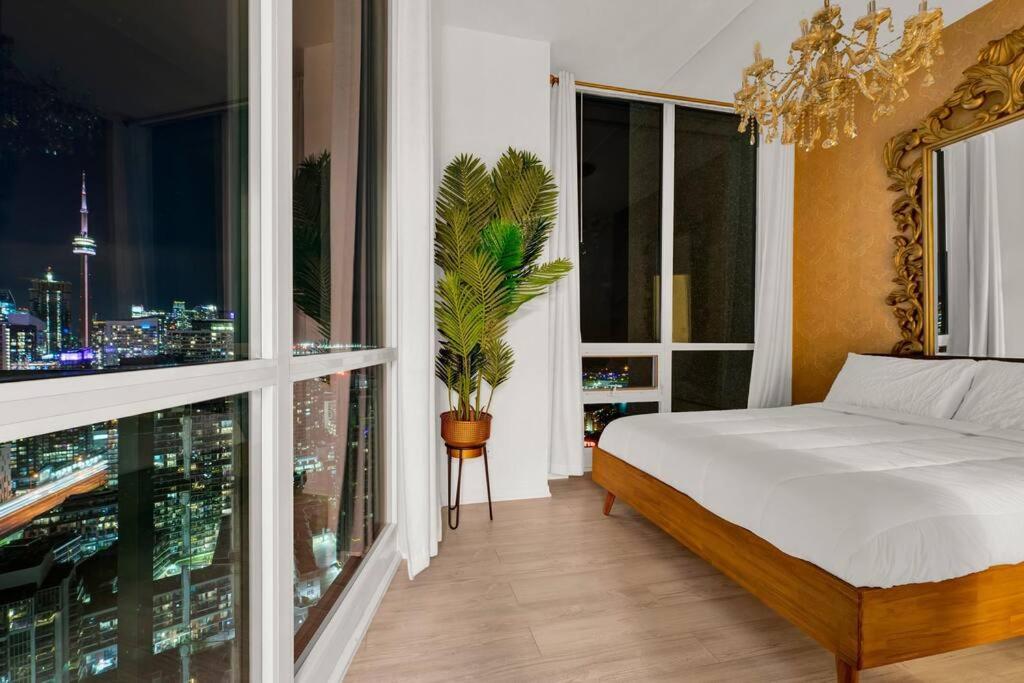Penthouse Corner Suite with Panoramic 12 FT Windows