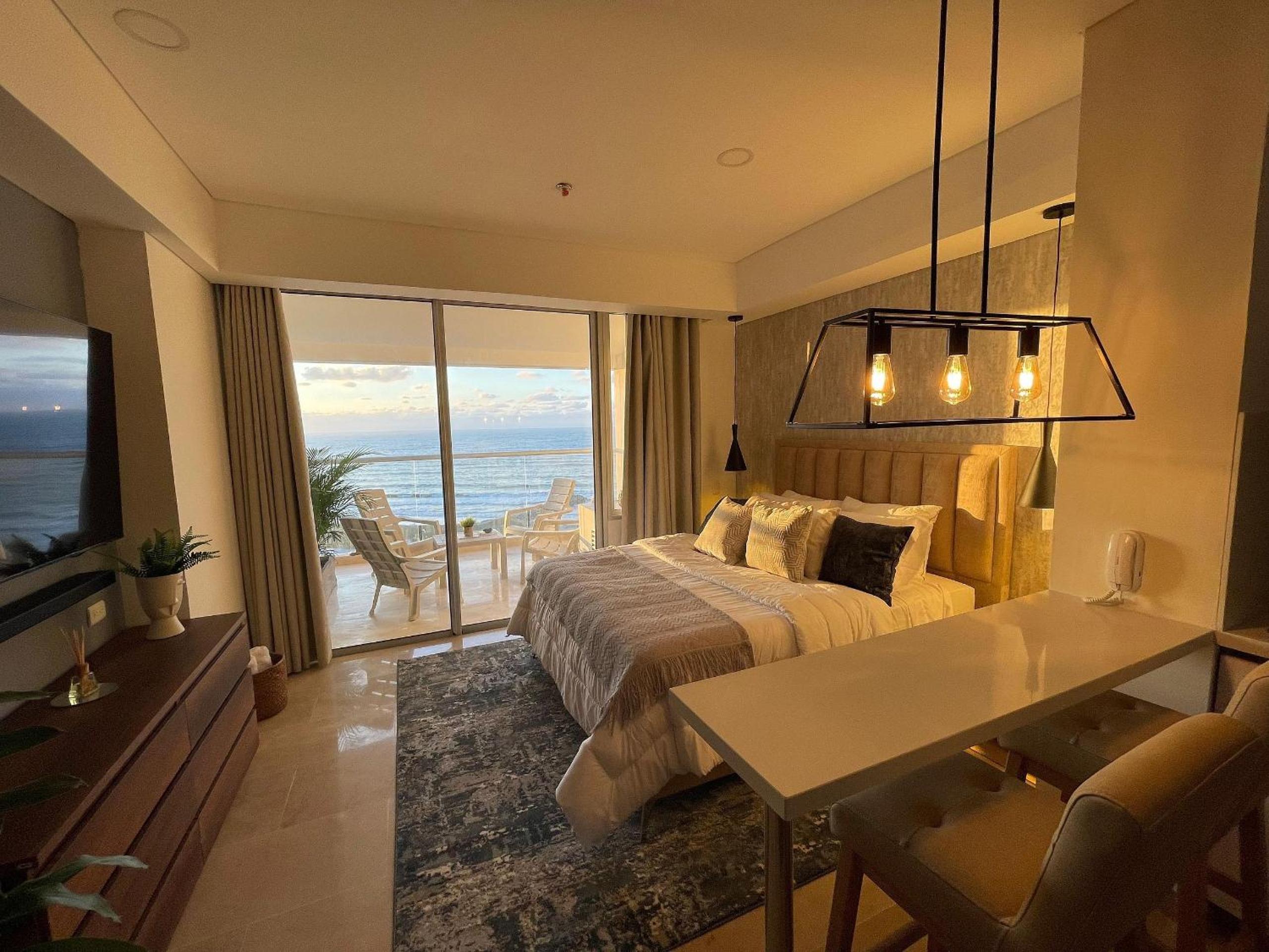 New exclusive beachfront condo