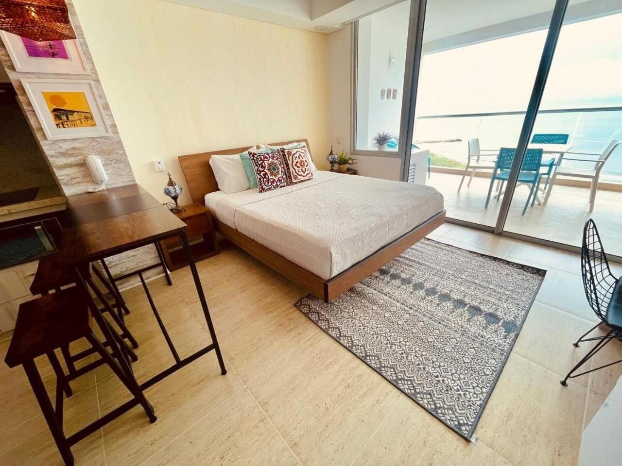 New exclusive beachfront condo