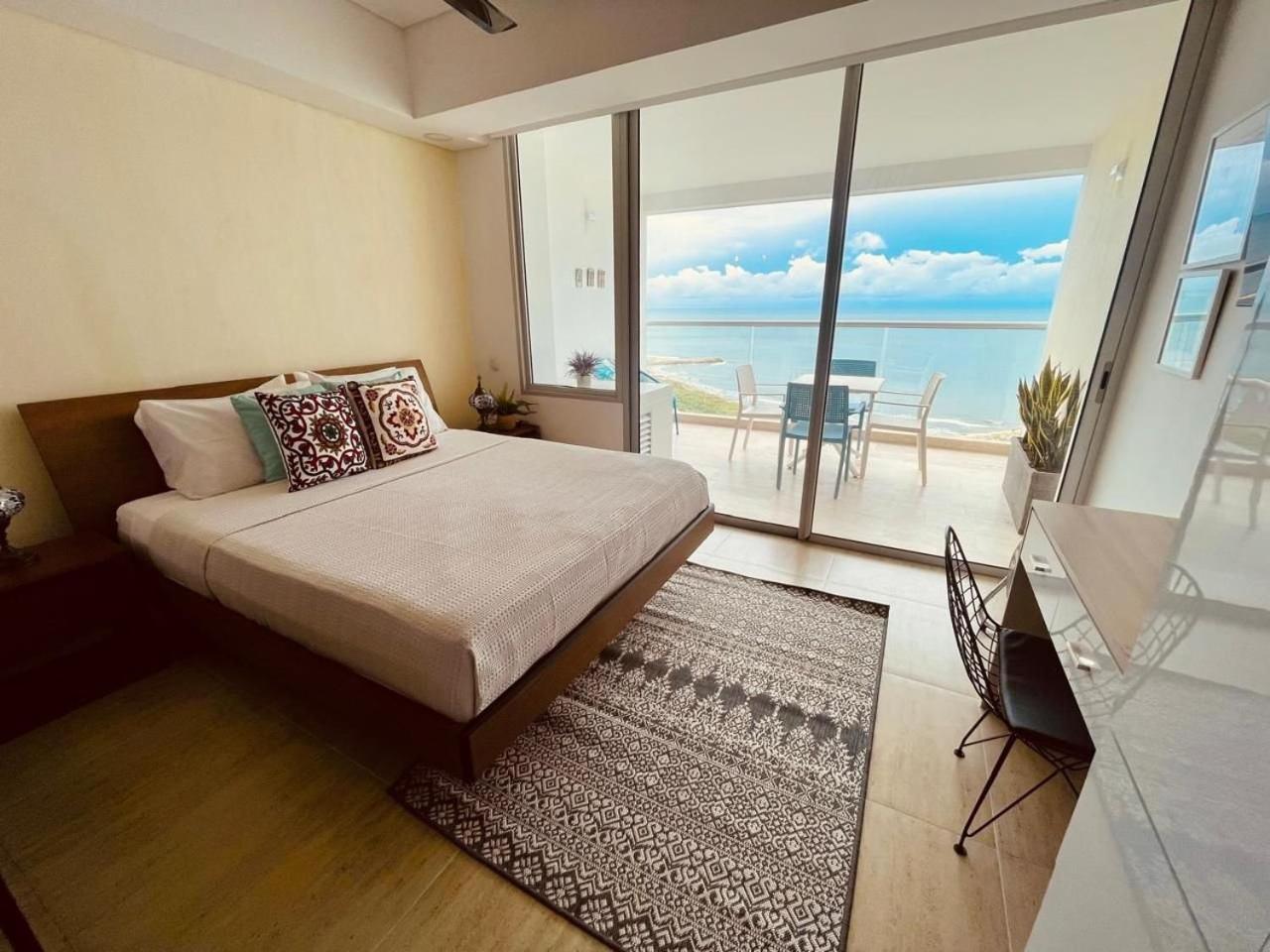 New exclusive beachfront condo
