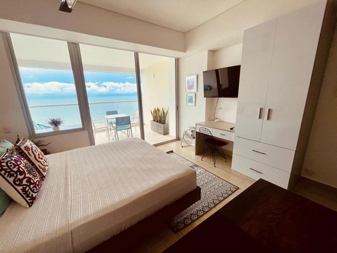 New exclusive beachfront condo