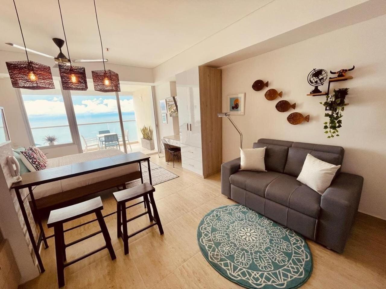 New exclusive beachfront condo