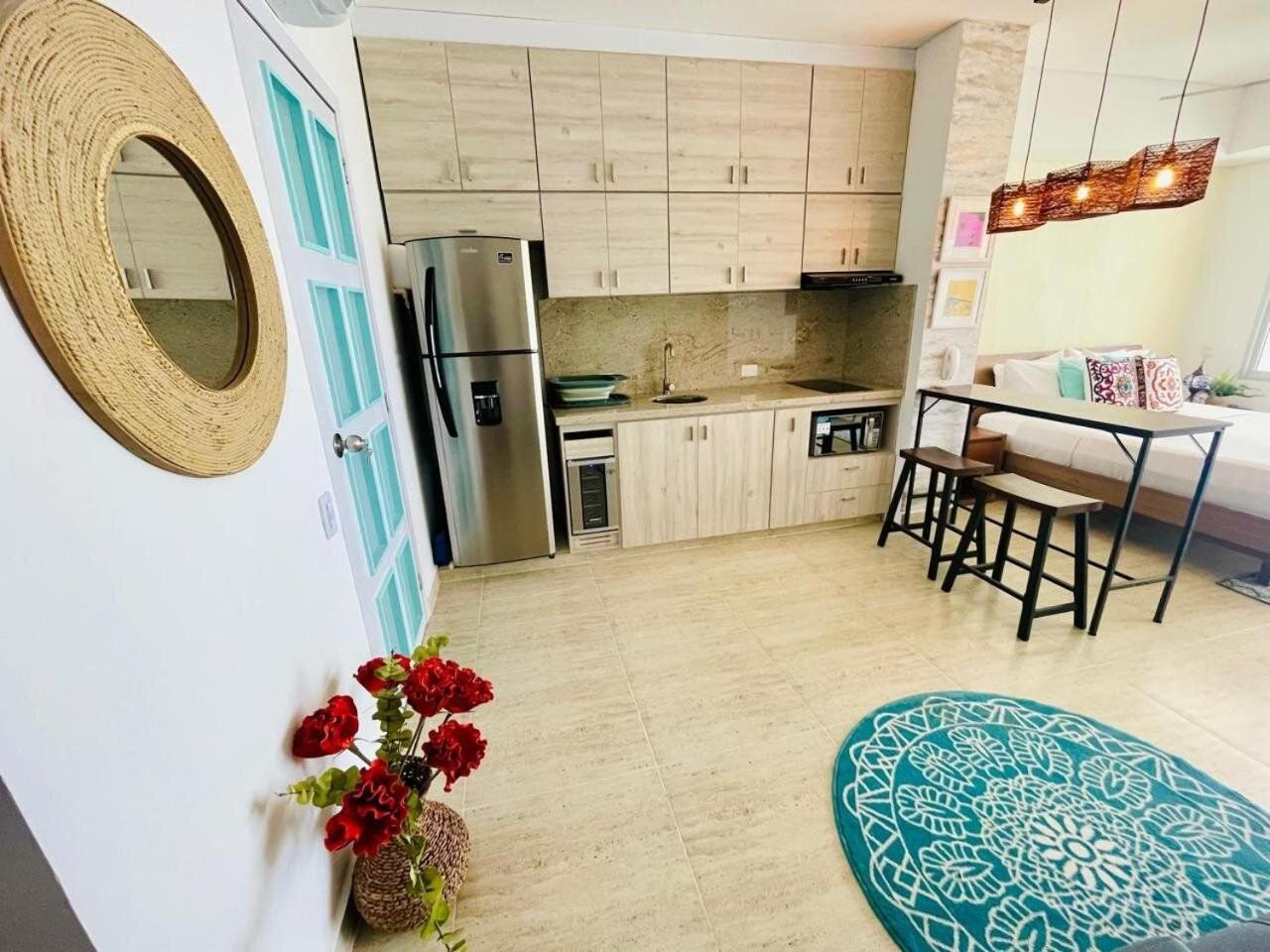 New exclusive beachfront condo