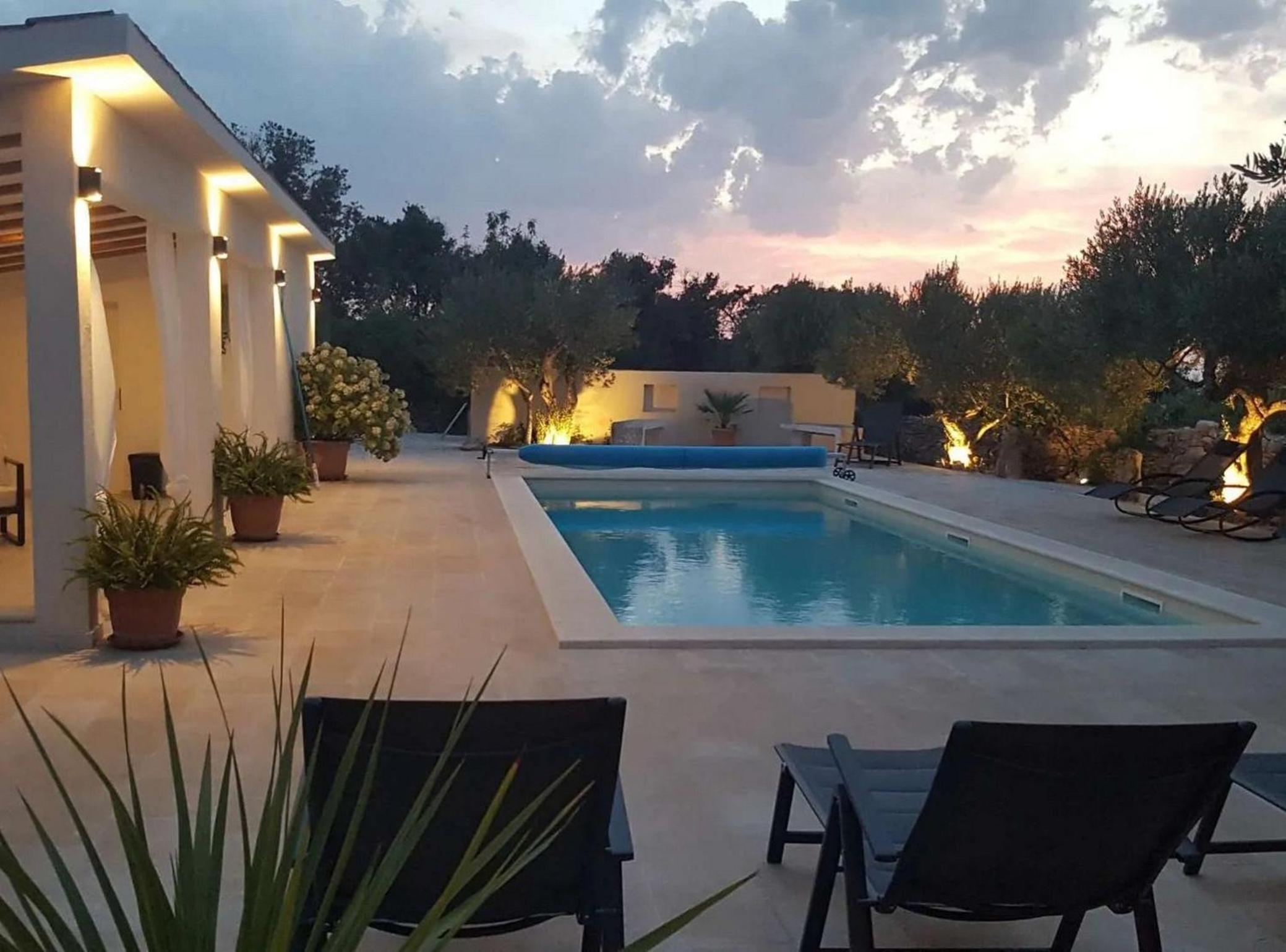 Secluded Oasis with Pool, Outdoor Kitchen, & Landscaped Terraces view 4