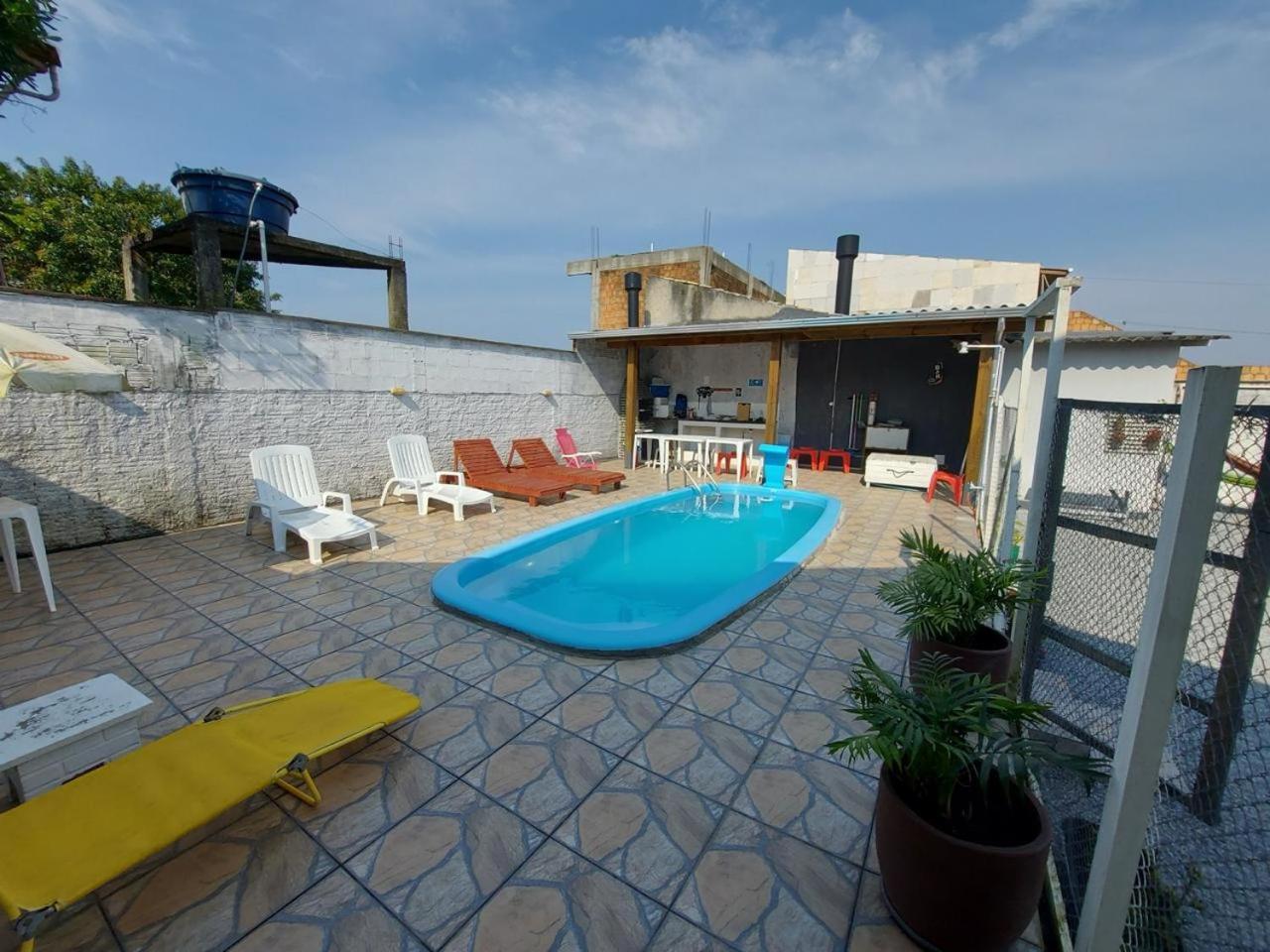 Casa de praia com piscina proximo a praia do Sonho e Pinheira - SC