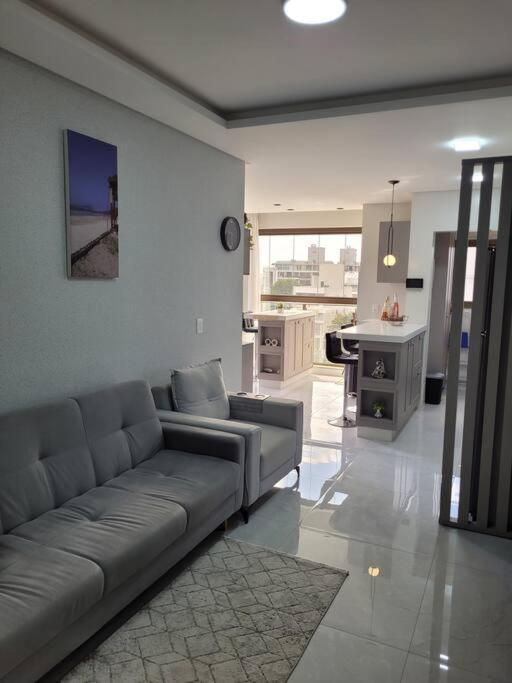 2 suítes novo, vista mar, alto padrão, piscina aquecida condominio