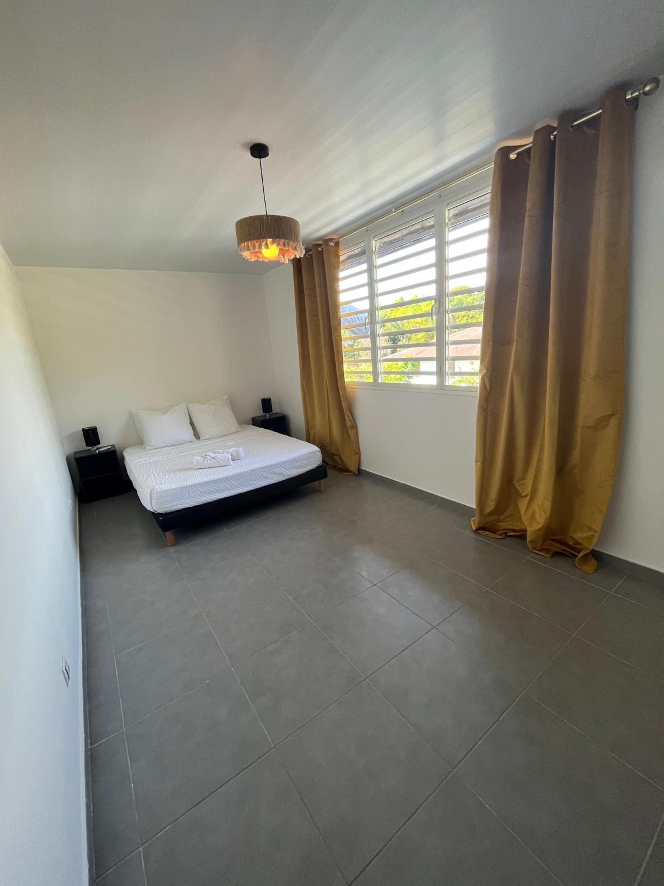 Maison de ville Duplex T3 I Jardin