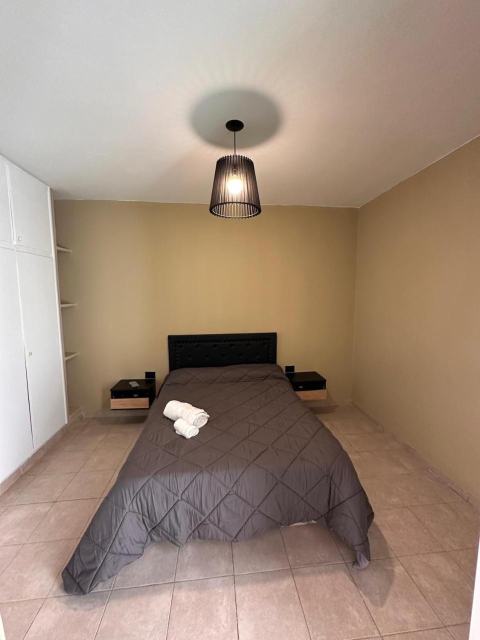 Moderno Apart Centrico para 4 Personas con Patio