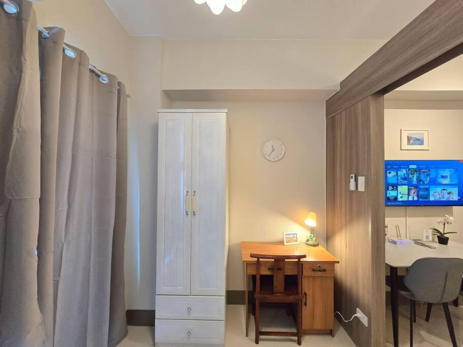 1BR Condotel with Balcony at FAME Residences #FM58 view 2
