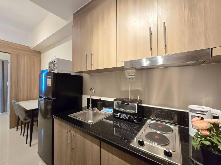 1BR Condotel with Balcony at FAME Residences #FM58 view 4