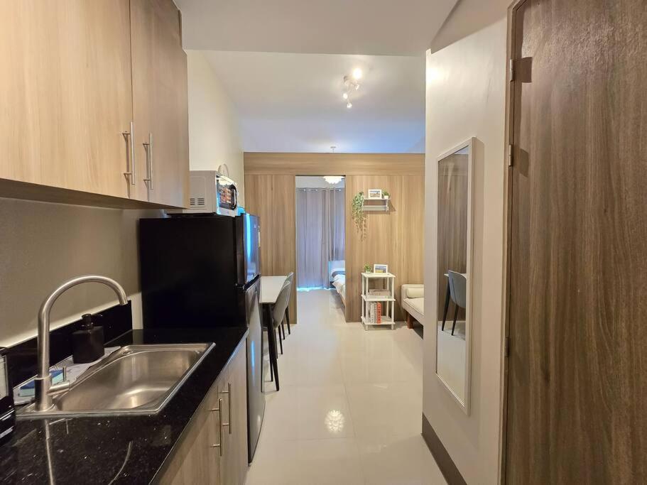 1BR Condotel with Balcony at FAME Residences #FM59 view 5