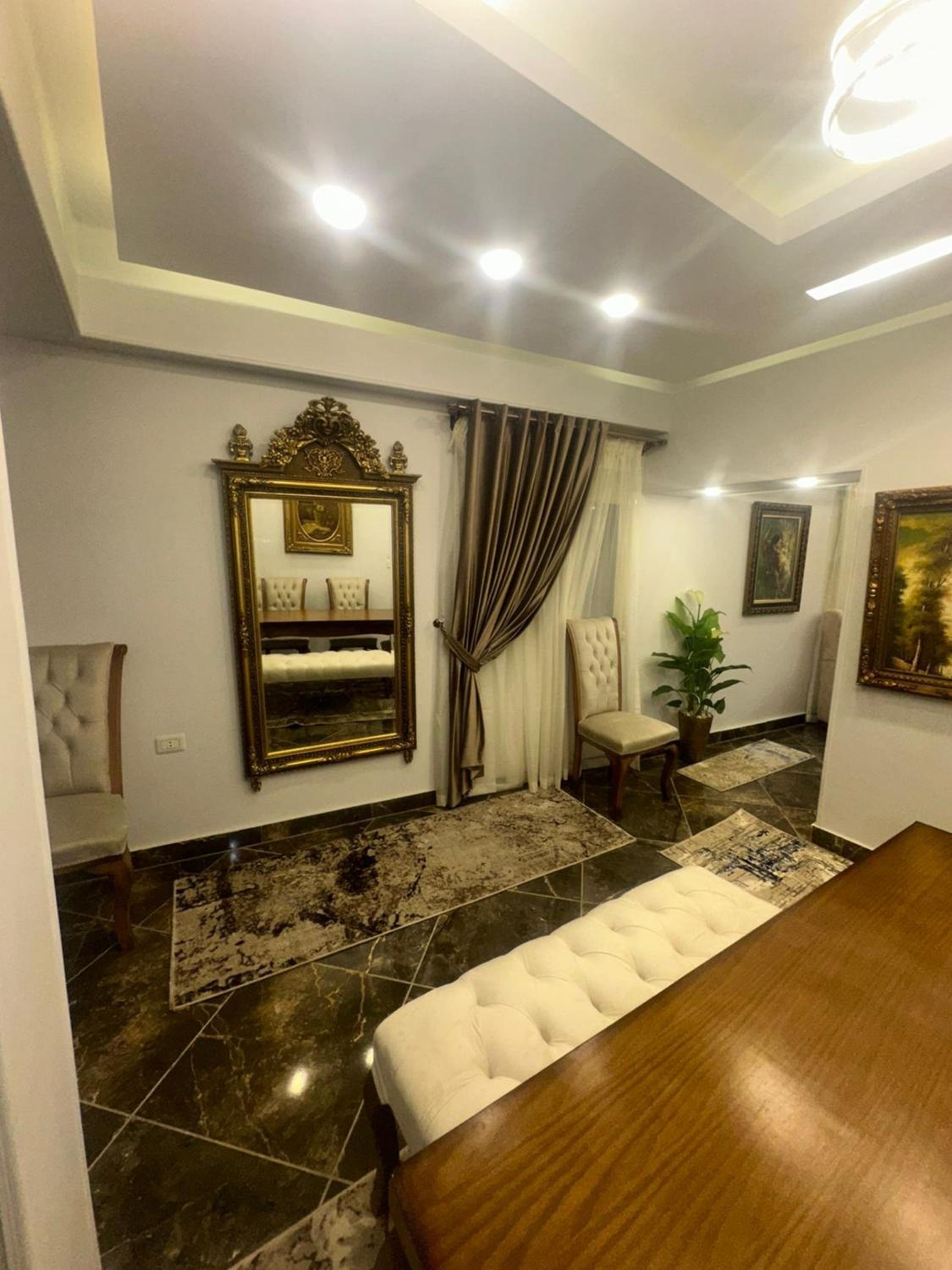 Well-furnished 2BR Apartment in Sphinx Square El Agouza