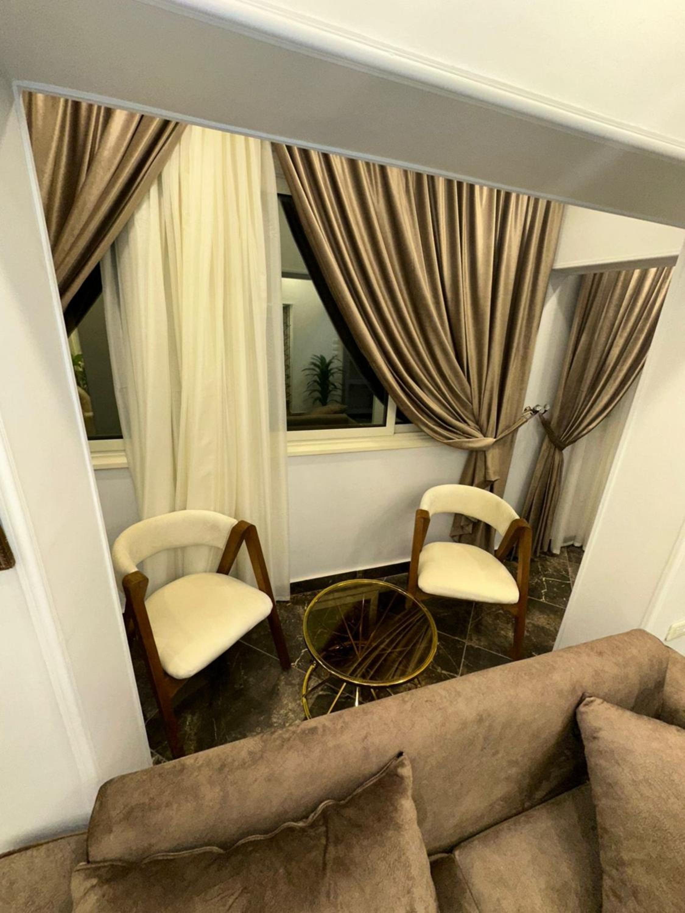 Well-furnished 2BR Apartment in Sphinx Square El Agouza