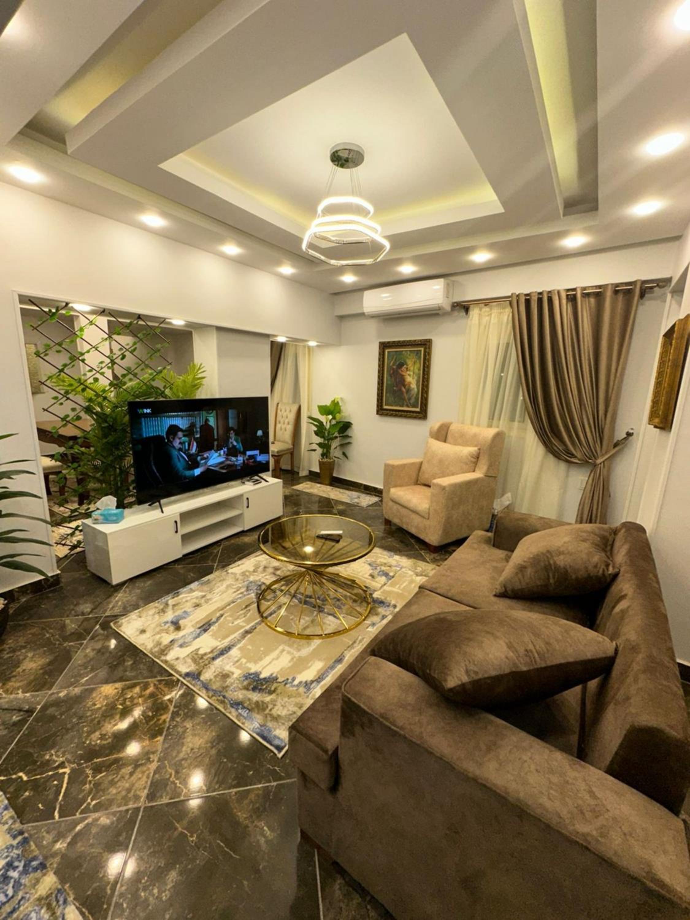 Well-furnished 2BR Apartment in Sphinx Square El Agouza
